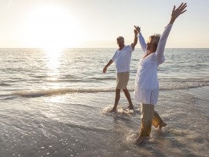 Happy Senior Couple Holding Hands Sunset Sunrise Beach